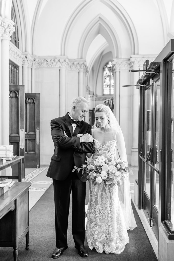 Bride and father share last moments together before she walks down the aisle