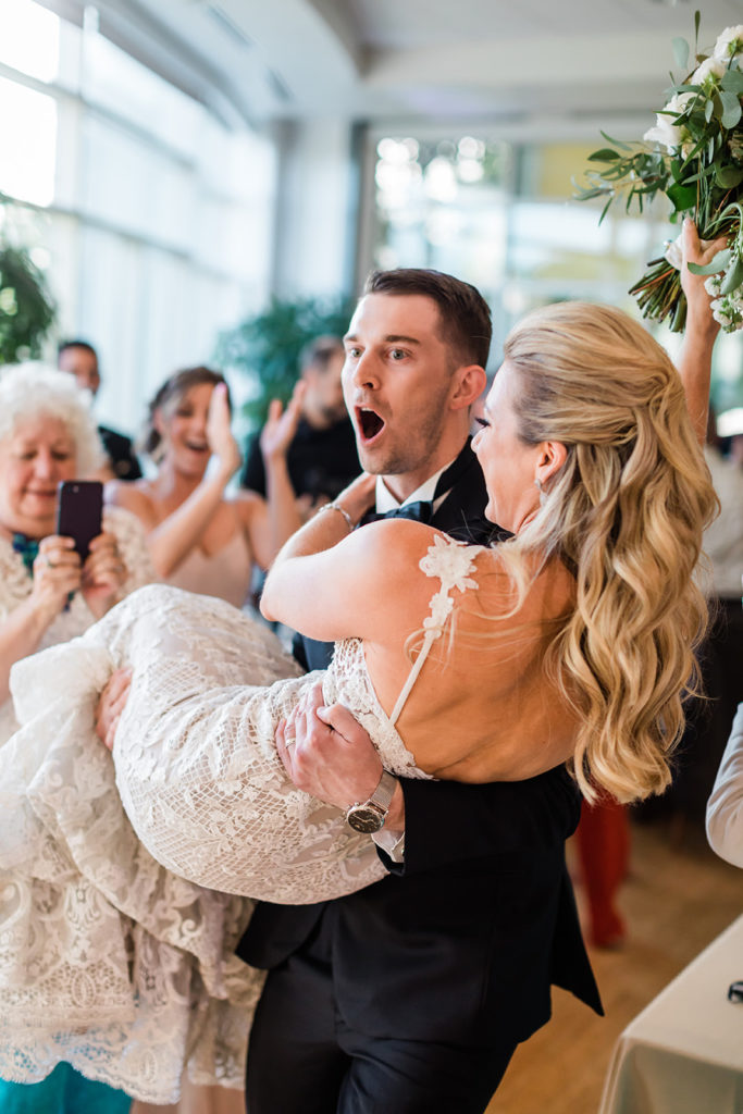 Bride and groom enter reception at Elegant-Phipps-Conservatory-Wedding