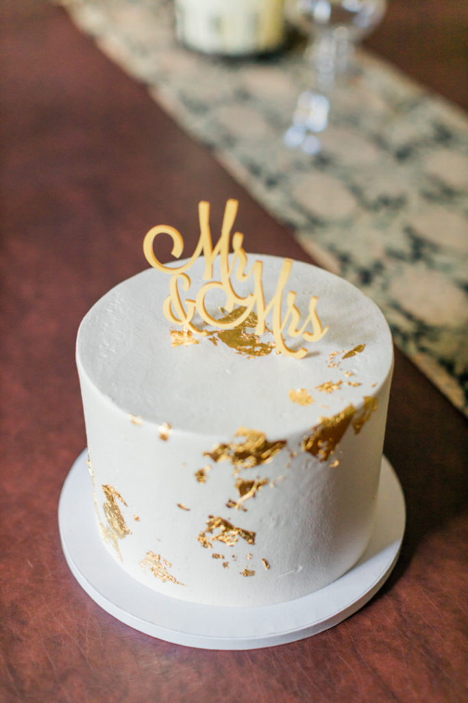 Gold foil flecked wedding cake from Tasty Bakery