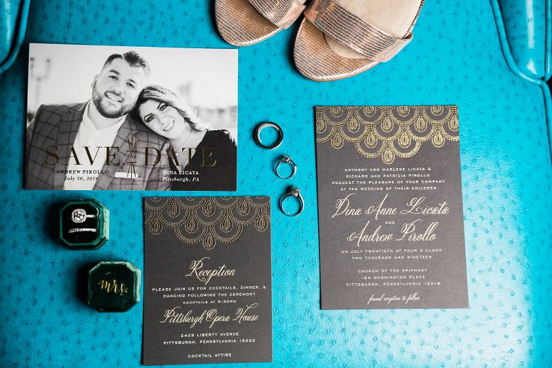Detail photo of stationery, rings and shoes