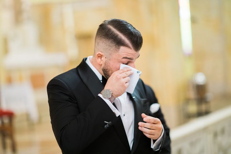 Groom cries as bride approaches the altar
