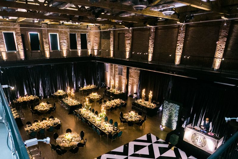 Black, white and gold dance floor and tables for Glam Pittsburgh Opera Wedding Reception