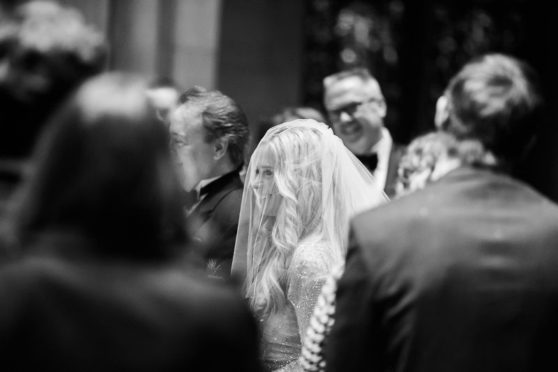 Bride and father walk down the aisle at Heinz Chapel
