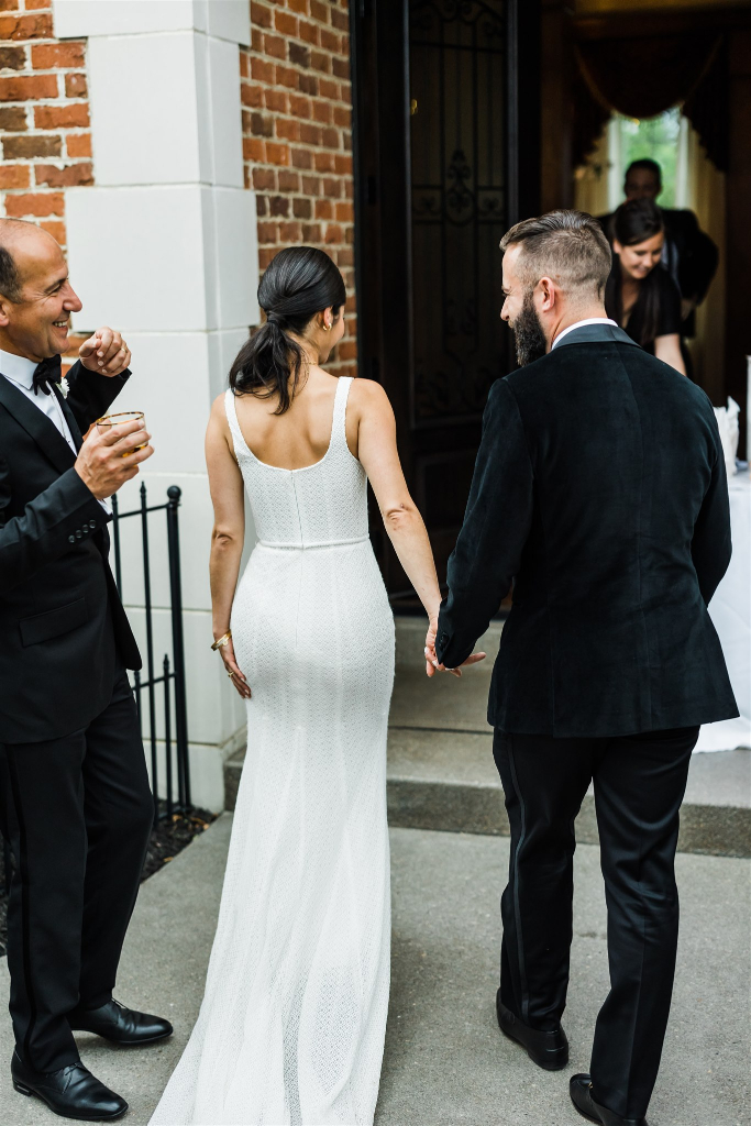 Bride and groom enjoy their Luxe Intimate Home Wedding reception