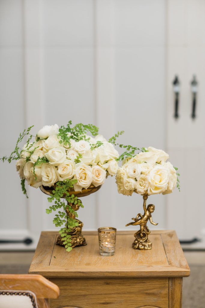 All white centerpiece decor at Luxe Intimate Home Wedding reception