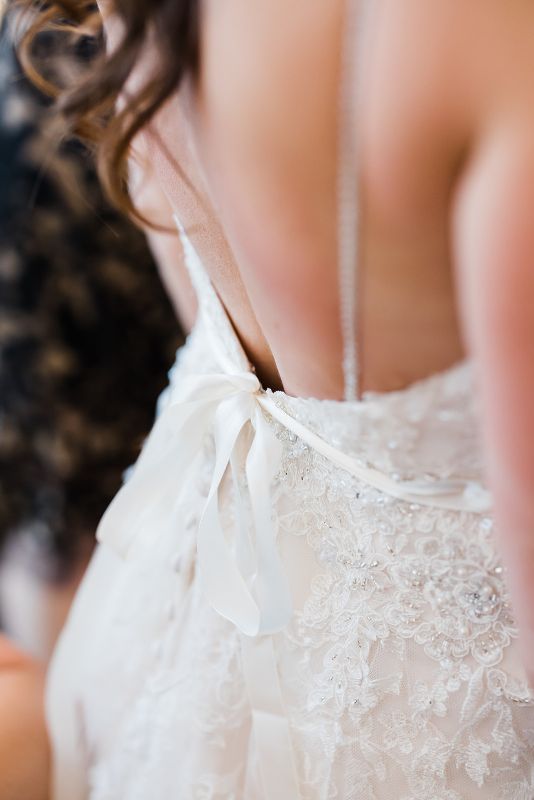 Macro photo of back of wedding gown