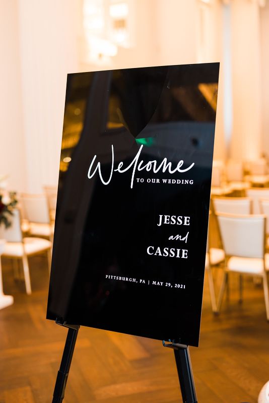Black and white welcome sign for hotel Monaco wedding