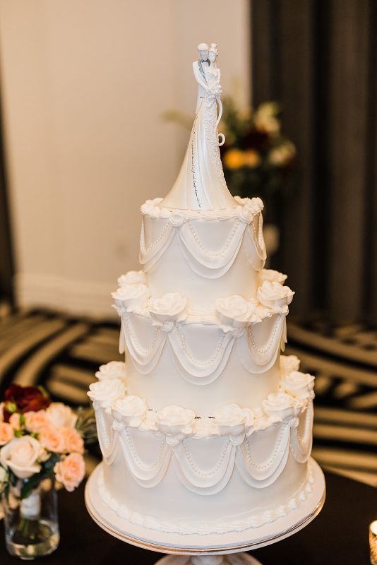 all white wedding cake from Oakmont Bakery
