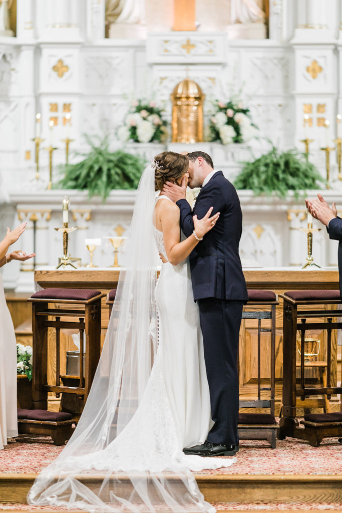 Bride and groom share first kiss at St. Mary of the Mount church wedding