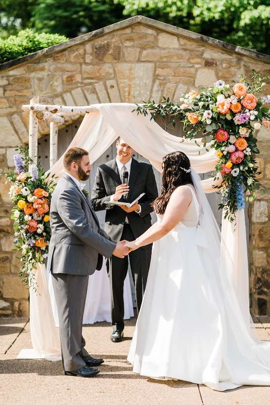 Bride and groom say their vows at the Pittsburgh Botanic Garden