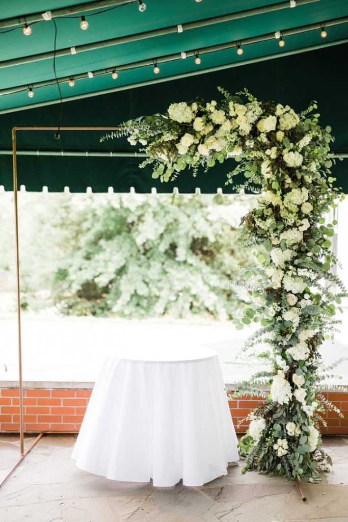 Ivory and Green floral arch with gold details