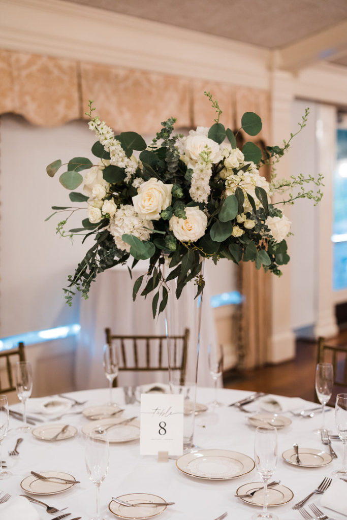 White, ivory and green high centerpieces at Oakmont Country Club wedding