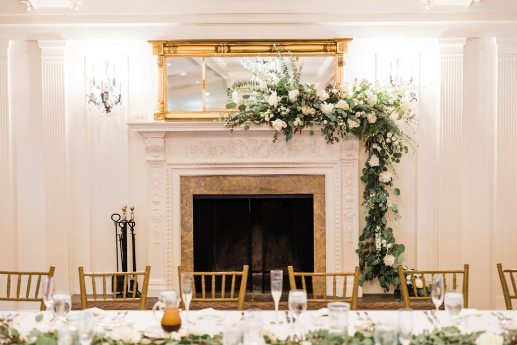 Decorated fireplace at Oakmont Country Club wedding