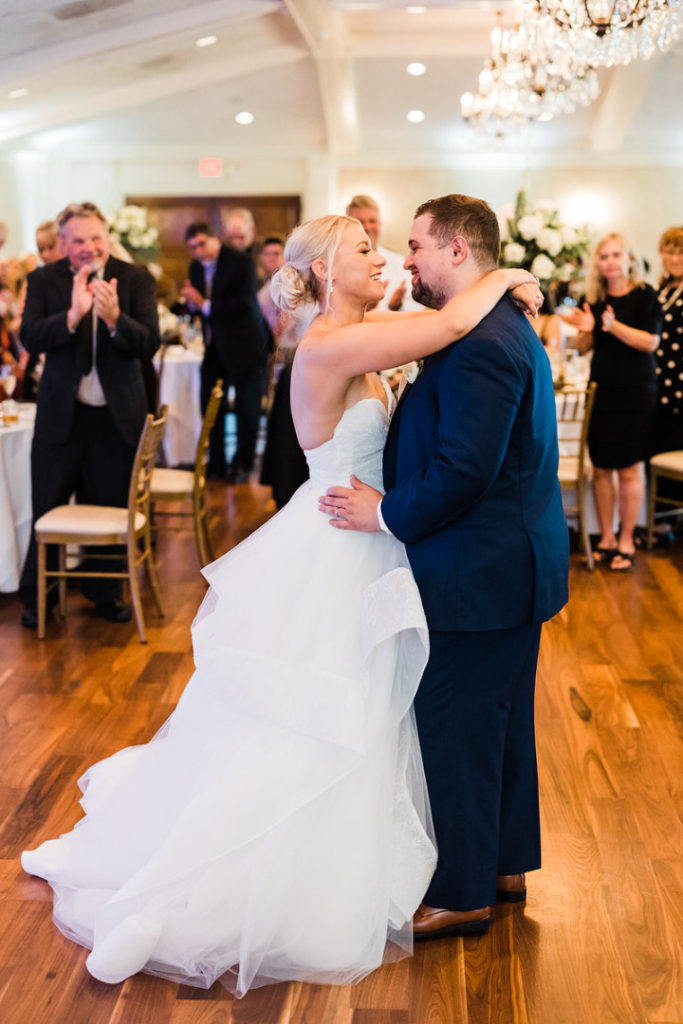 Bride and groom share first dance together at Oakmont Country Club Wedding