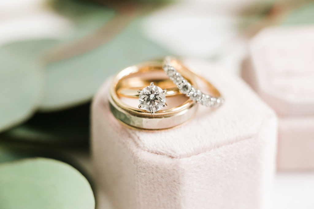 Macro photo of gold and diamond wedding bands