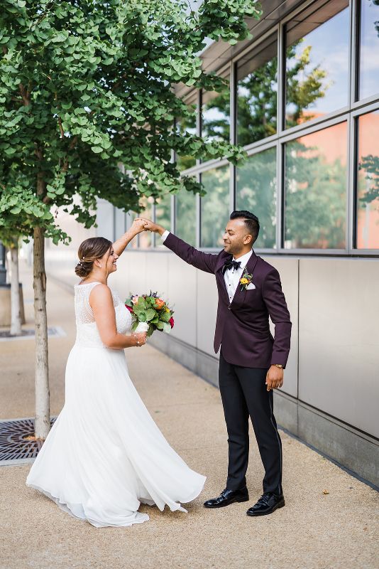 Groom spins bride outside in downtown Pittsburgh