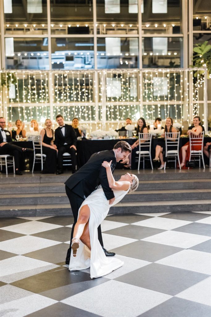 Bride and groom share first dance at PPG Wintergarden