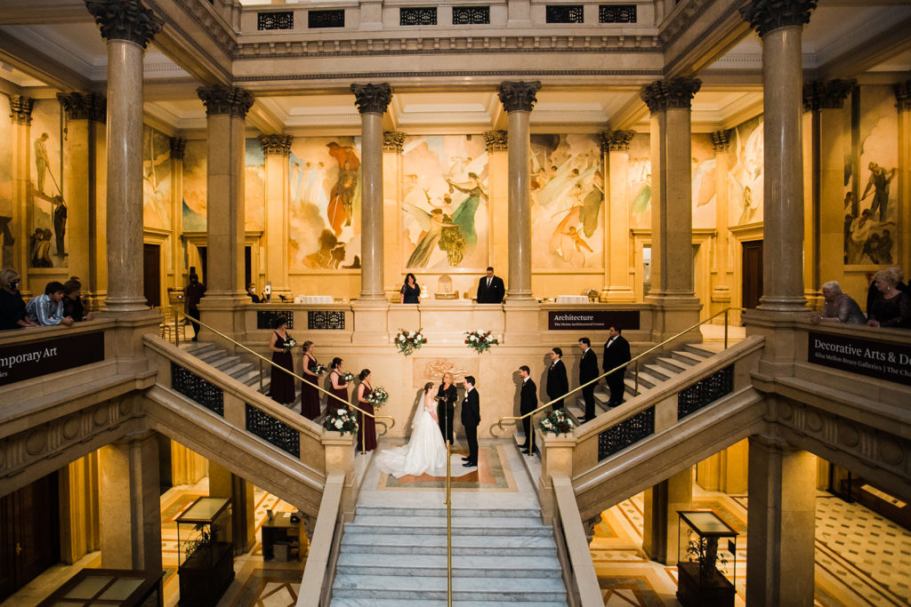 bride and groom get married on the stairs of the Carnegie Museum of Art steps