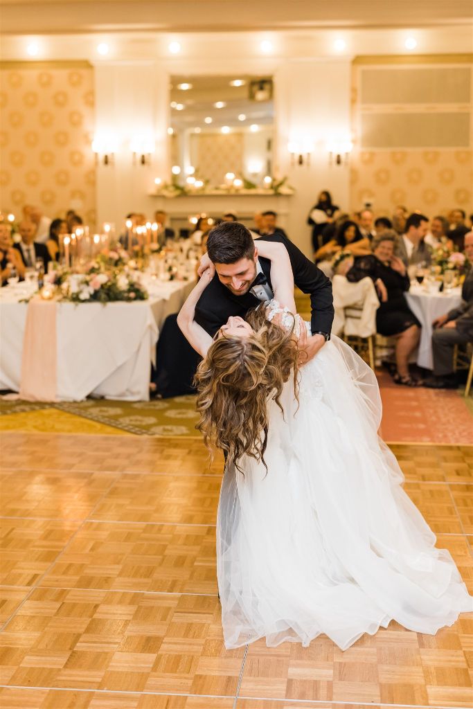 Bride and groom share a dance at wedding at Bedford Springs