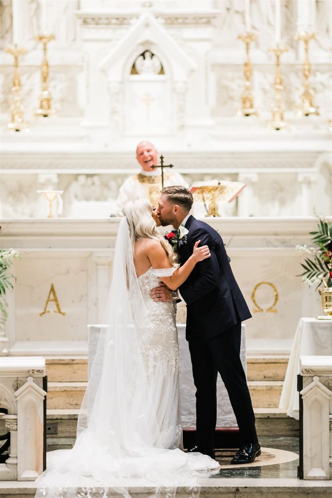 Bride and groom share first kiss as husband and wife 