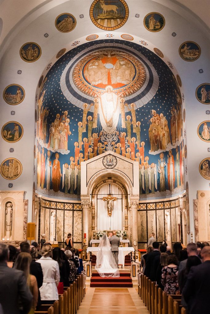 Wedding ceremony at Assumption Catholic church in Pittsburgh, PA