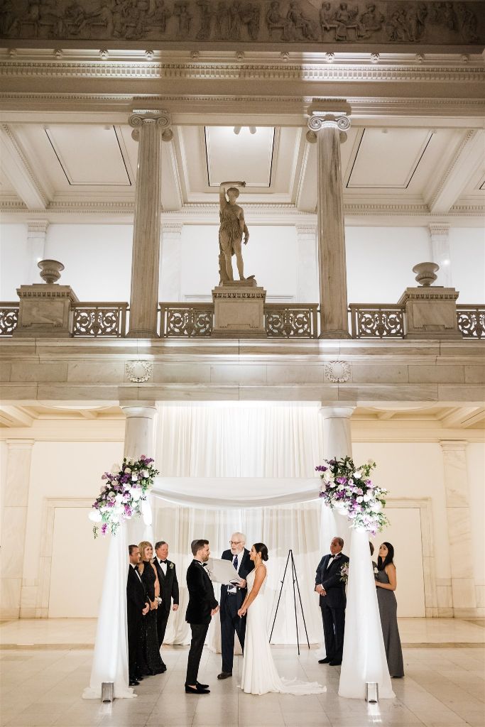 bride and groom say their vows at Jewish wedding at the Carnegie