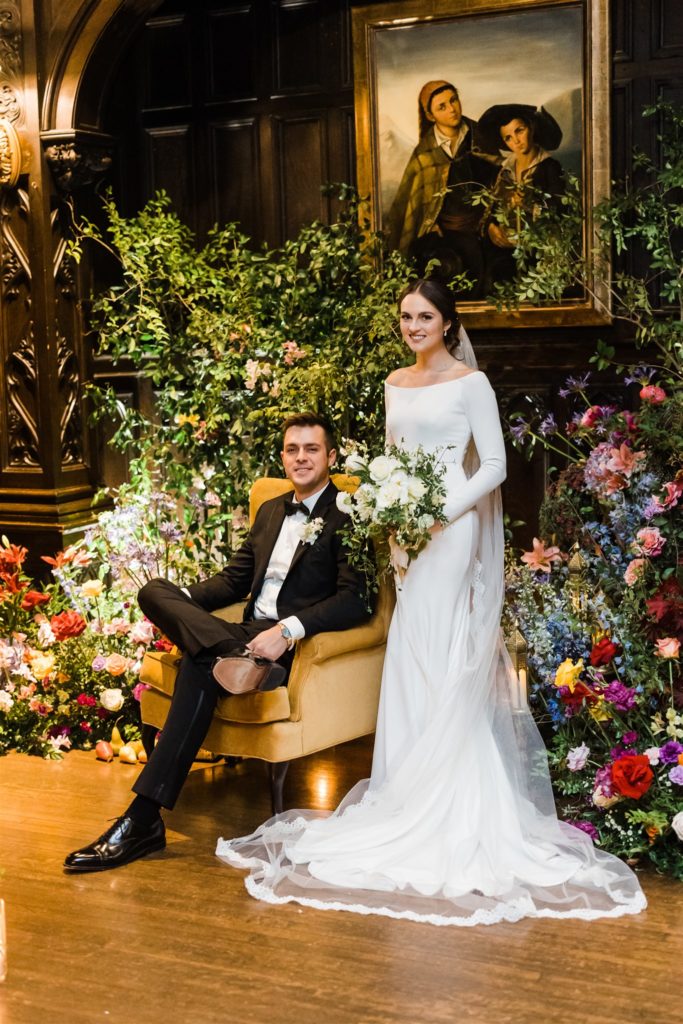 Bride and groom pose inside their  Mansions on Fifth wedding