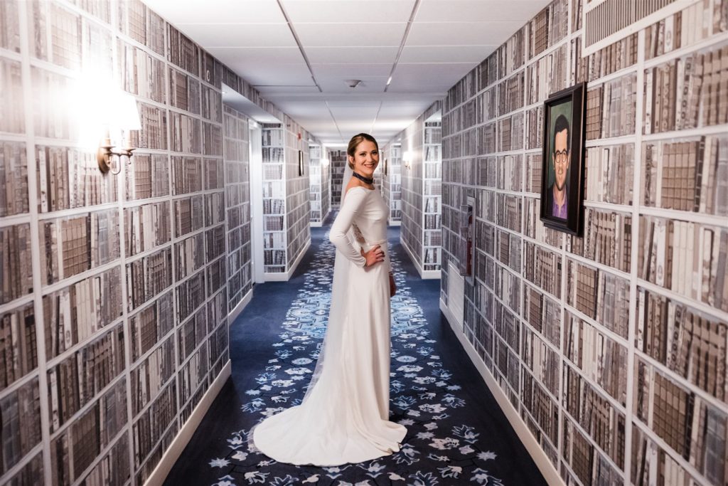 Bride poses in the hallway of the Graduate Hotel in State College