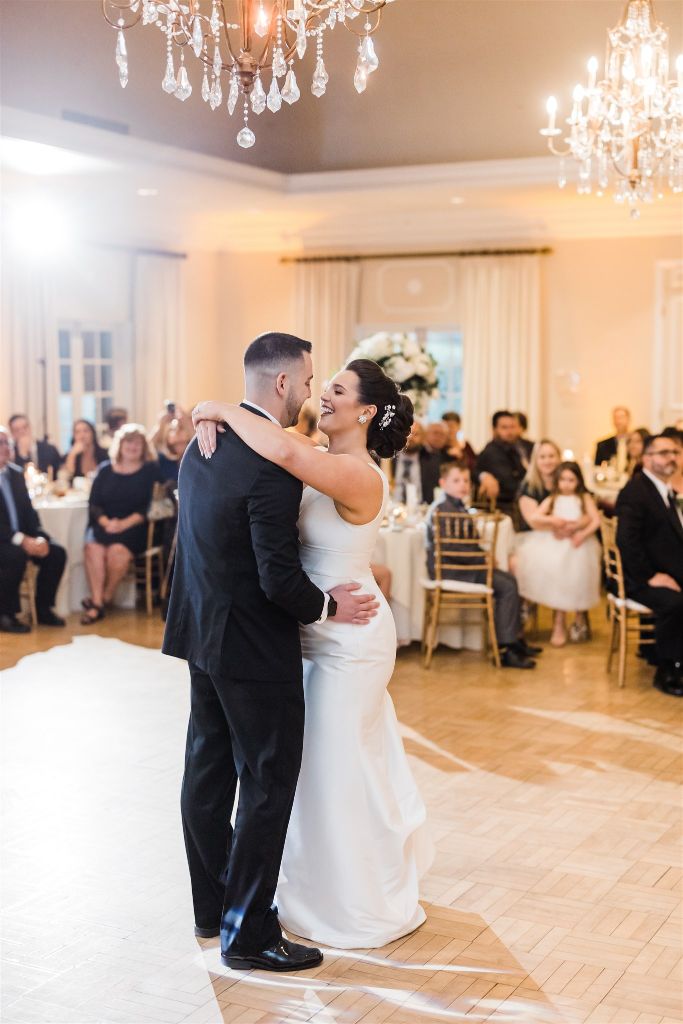 Bride and groom share first dance at wedding at Longue Vue
