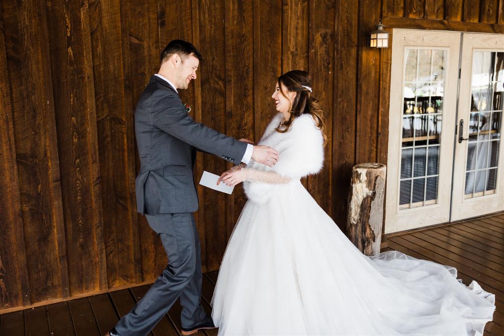 Bride and groom share first look at Armstrong Farms Winter Wedding