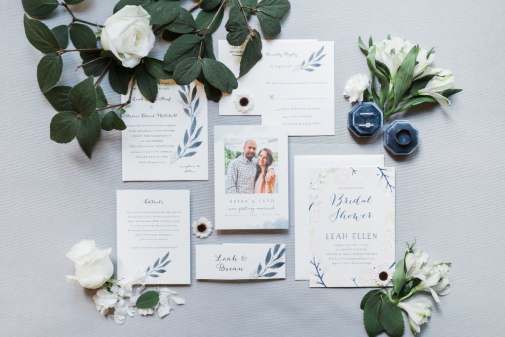 Flat lay of wedding stationery suite