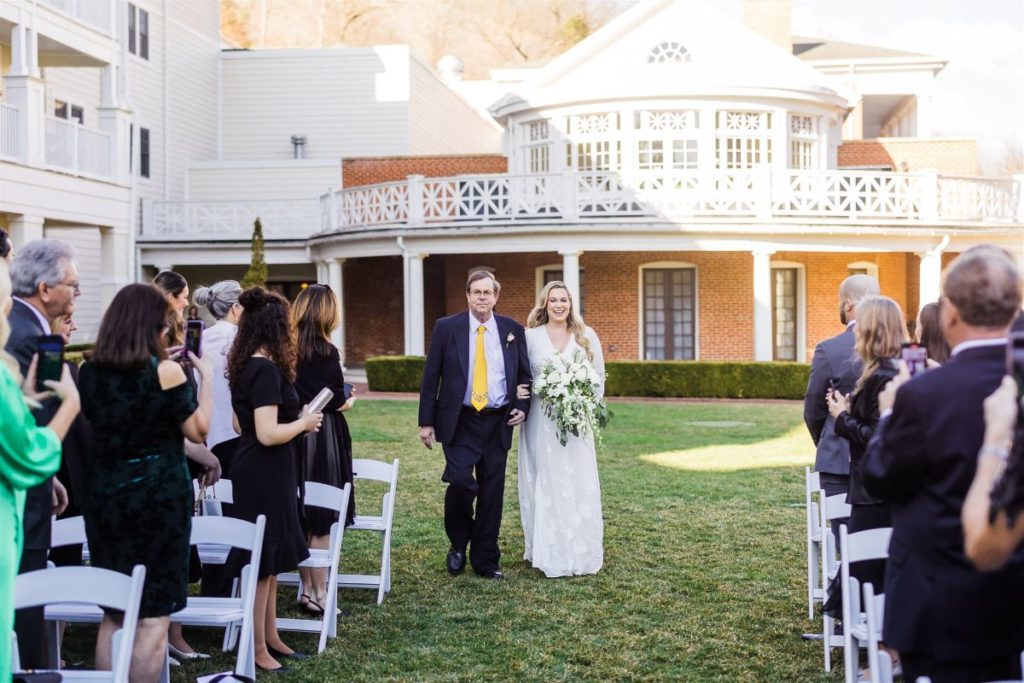 Bride walks down the aisle on the grand lawn at Bedford Springs Resort Wedding