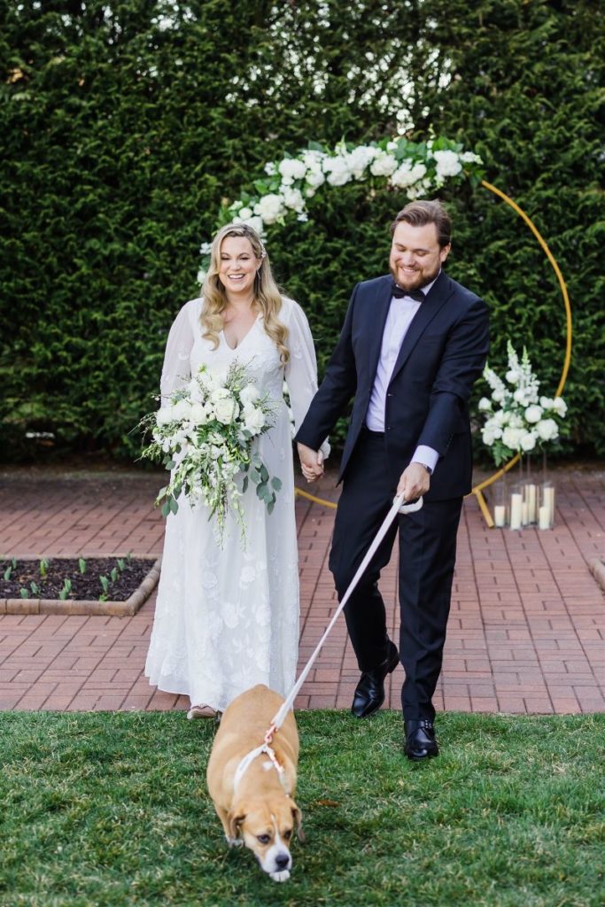 Bride and groom pose with their dog at Bedford Springs Resort wedding