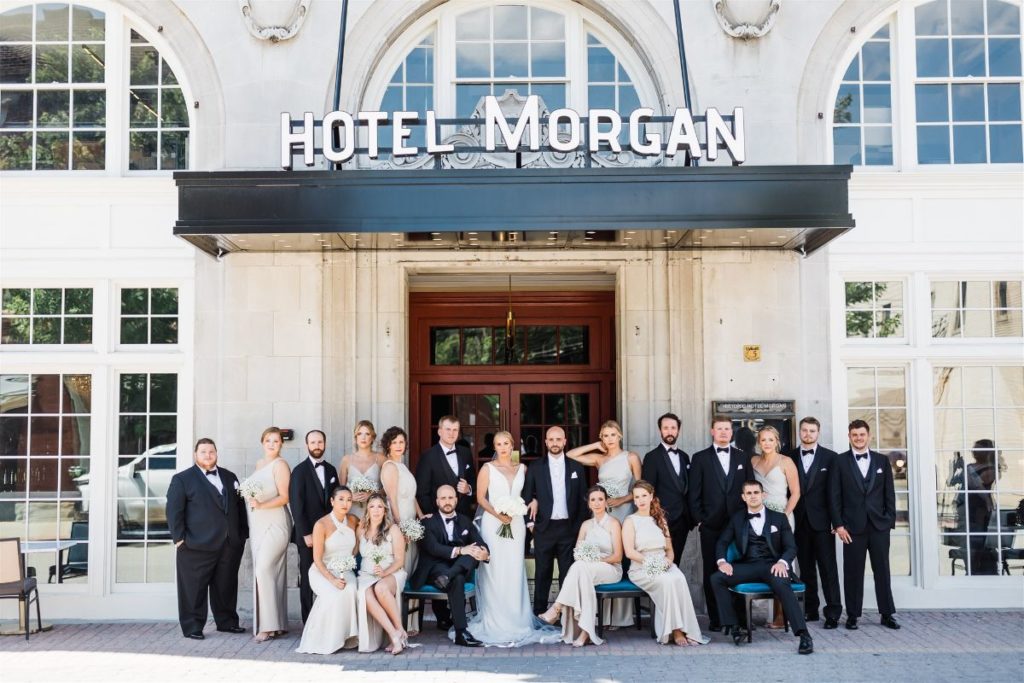 Summertime Hotel Morgan wedding photos in front of hotel