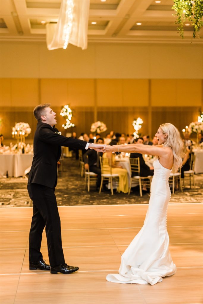 Bride and groom share first dance at Erie Bayfront Center wedding reception