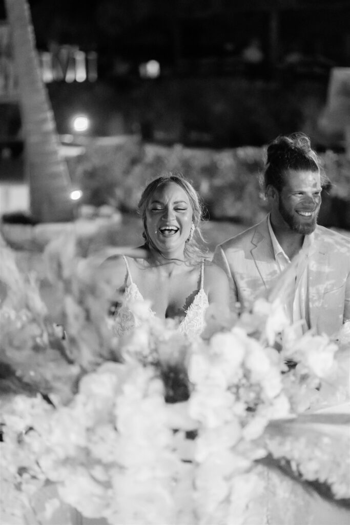 Bride and groom smiling at Cancun Destination Wedding Reception 