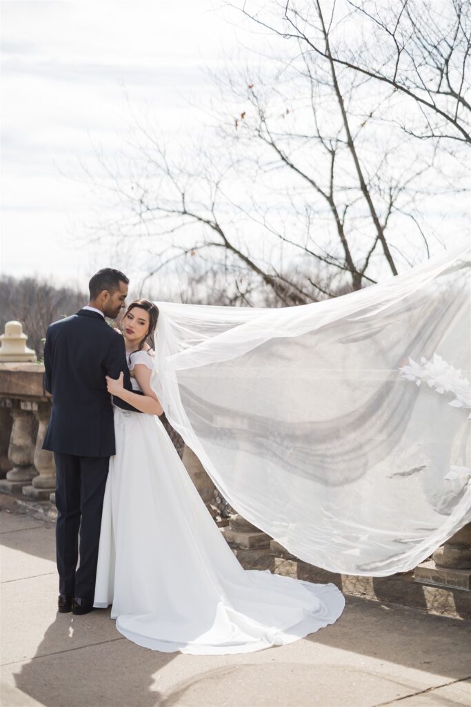 Outdoor portraits of bride and groom at Winter Wedding at the Mansions on Fifth